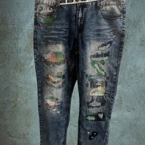 A Pair Of Slim-Fit, Tapered Jeans